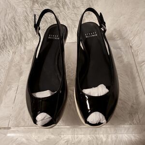 Stuart Weitzman sling back, black patent ,peep toe ,soft sole ,gently pre loved